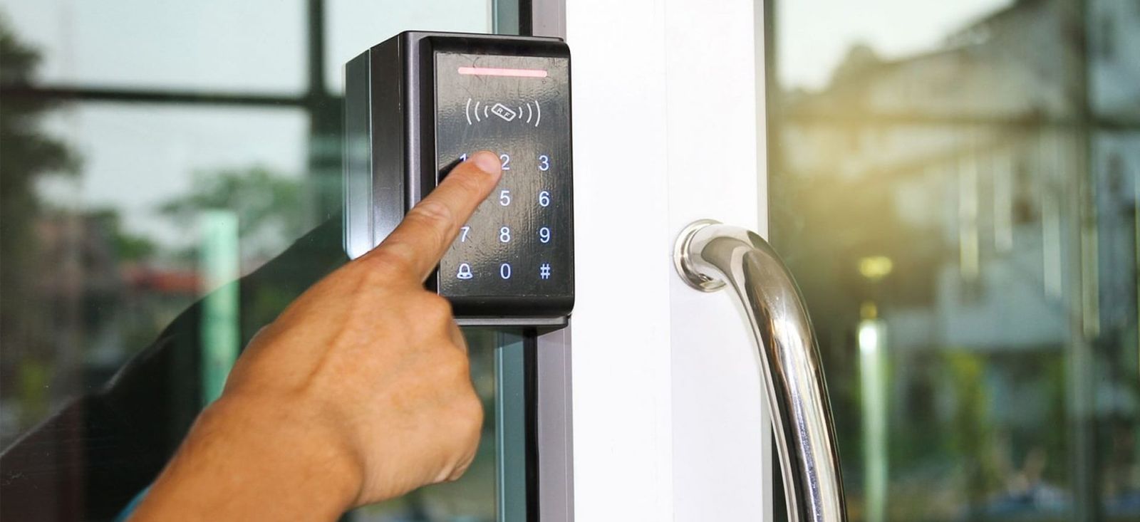 Commercial locksmith securing a business entrance